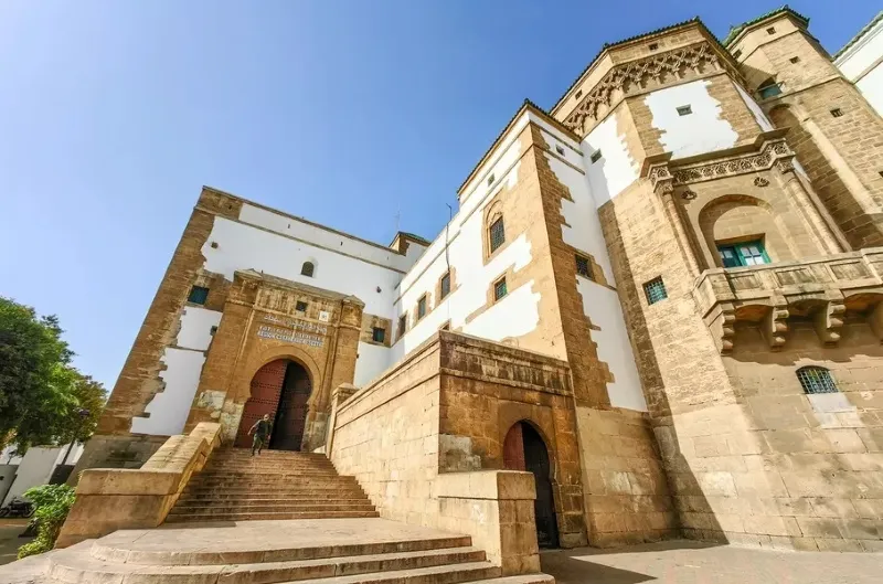 Entrance to the Sultan of Morocco's palace in Casablanca, showcasing intricate architecture and grand design.